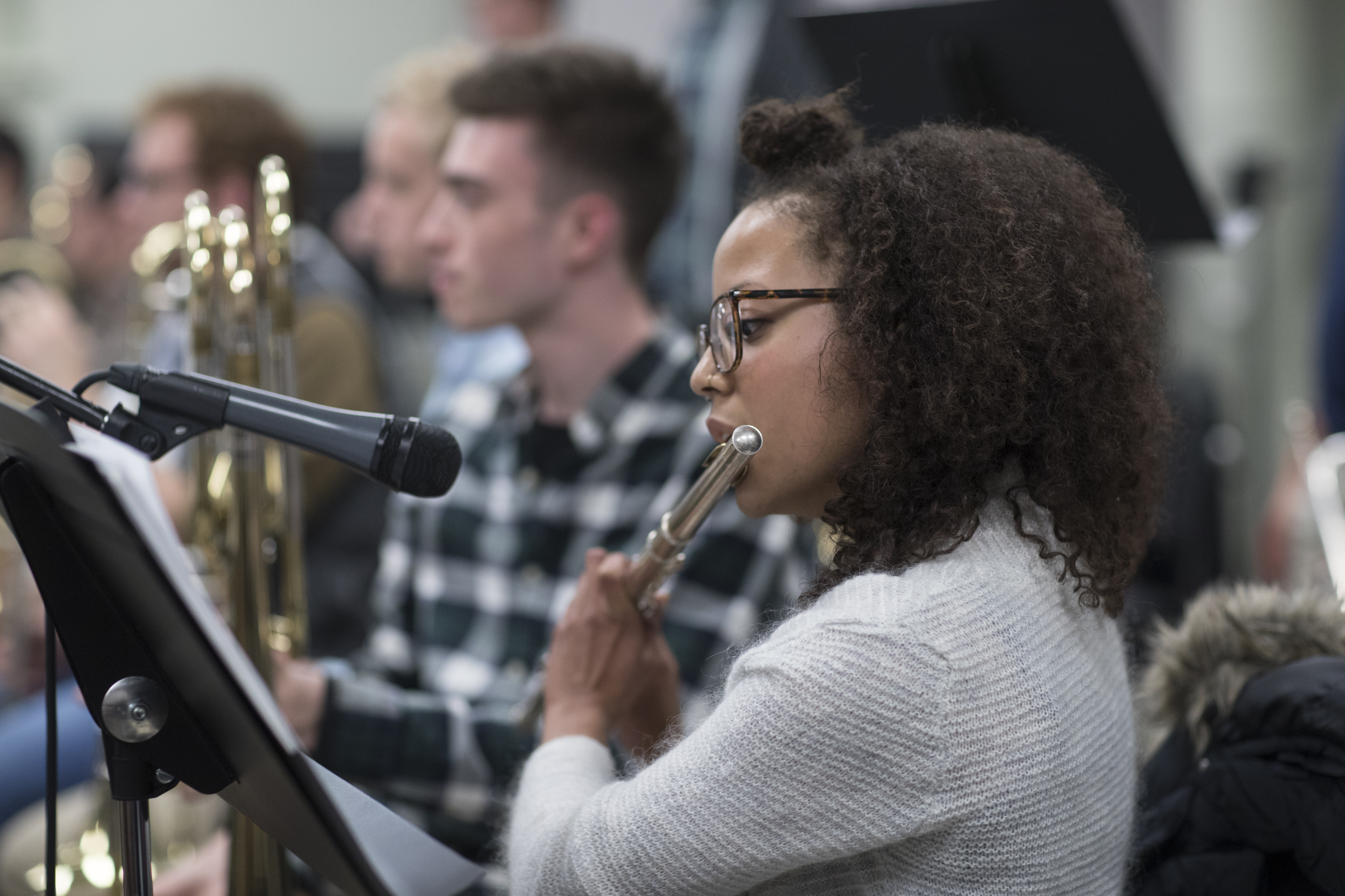 Student playing a flute