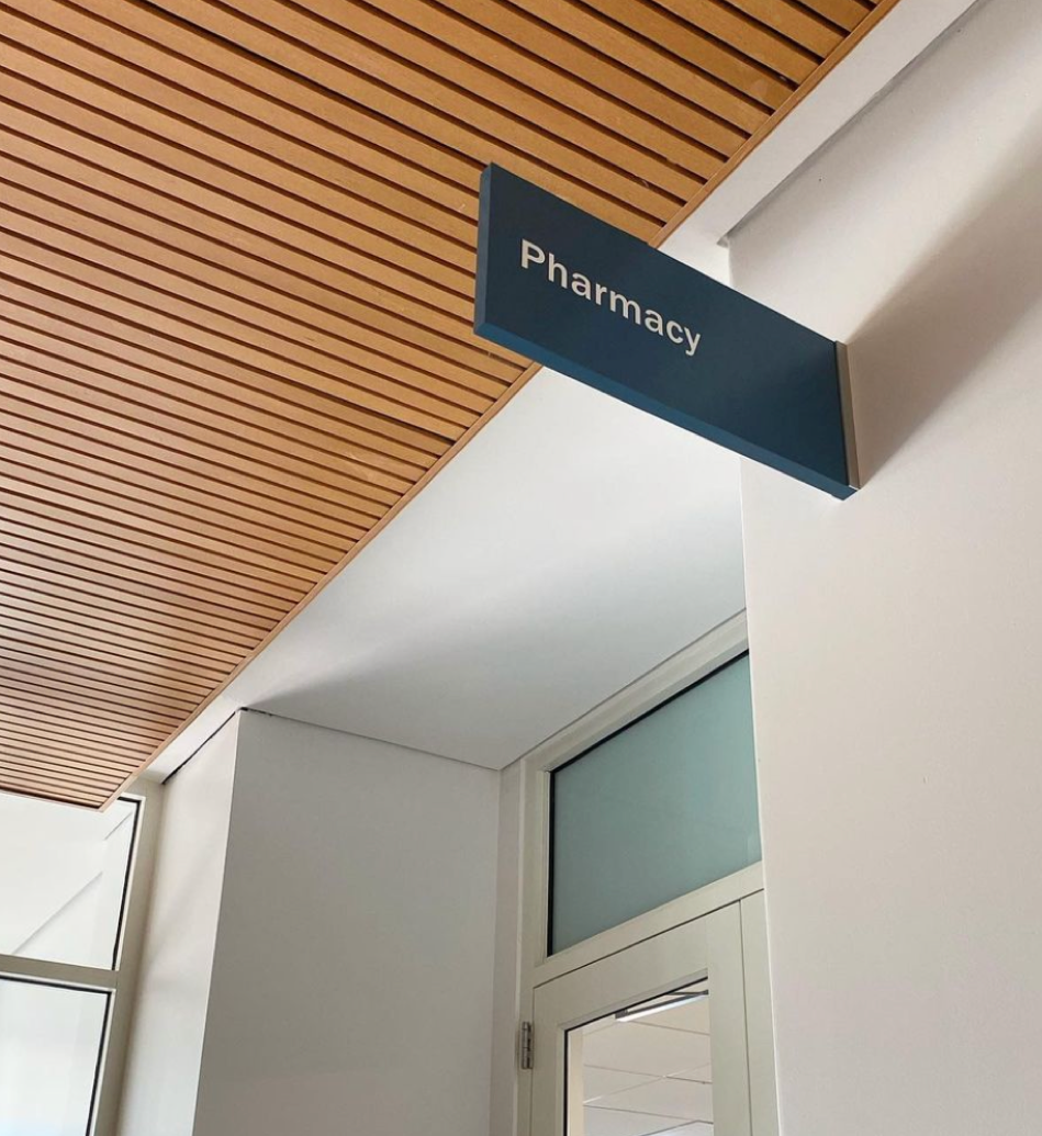 Pharmacy front door and sign