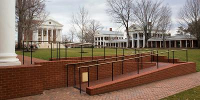 Brick wheelchair ramps on the University of Virginia lawn, Rotunda is in the background.