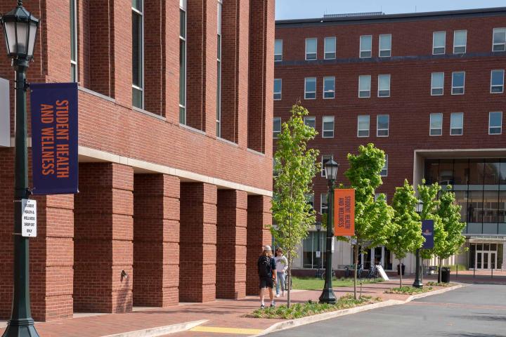 students walking outside building